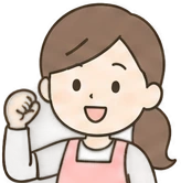 笑顔でガッツポーズをする職員
