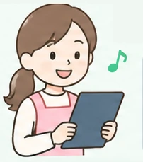 タブレットで記録を書く療育担当職員